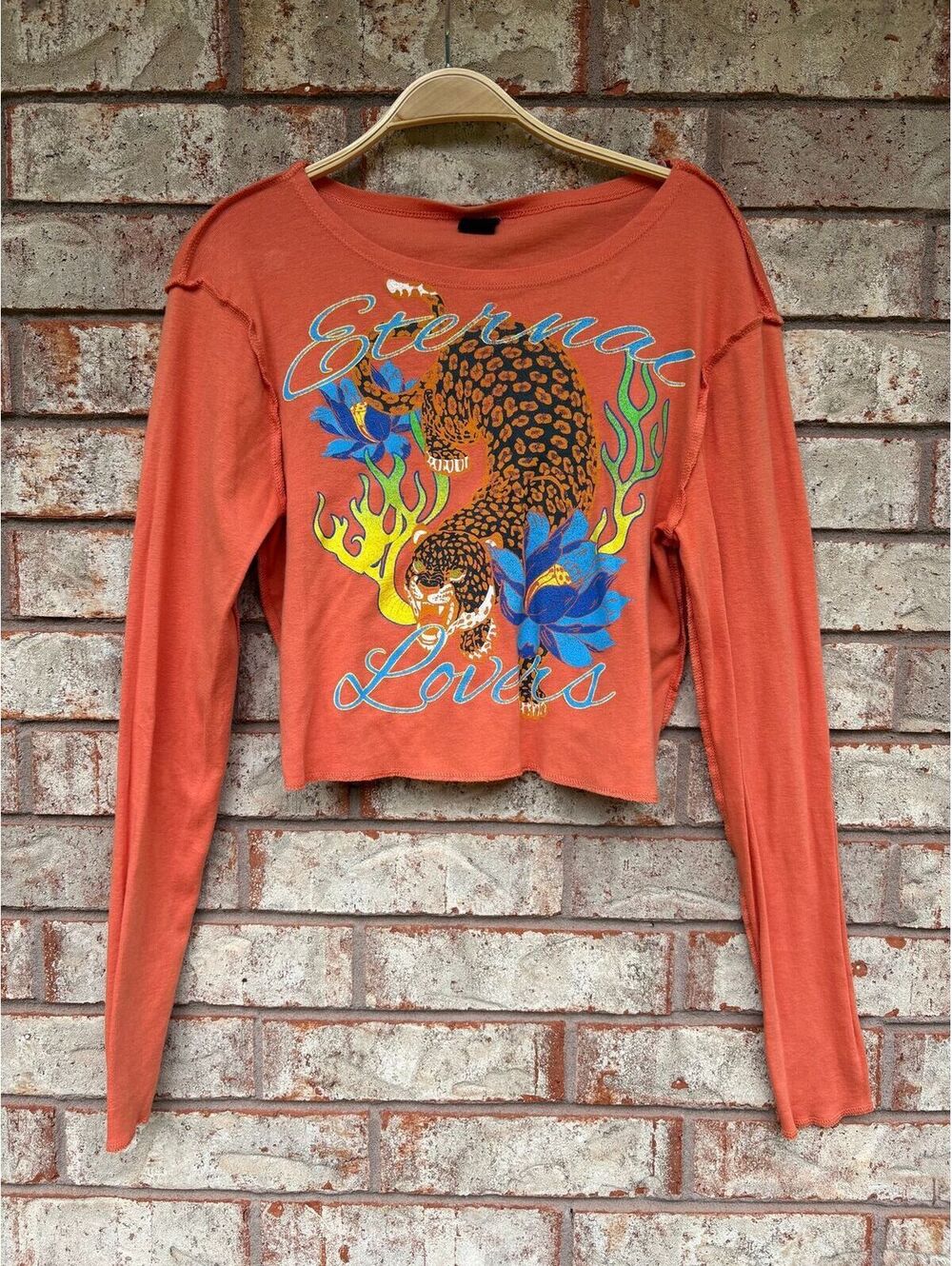 Urban Outfitters orange graphic top Size L